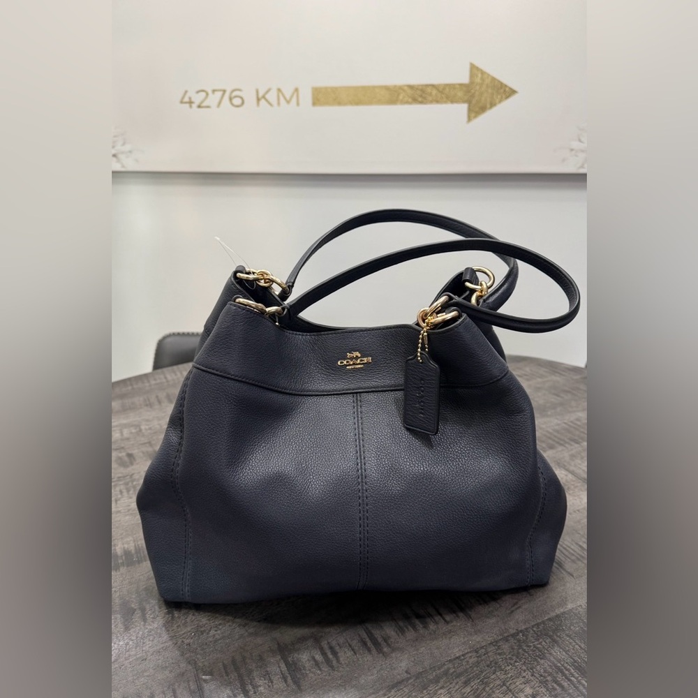 Coach Navy Blue Leather Hobo Bag with Gold Accents